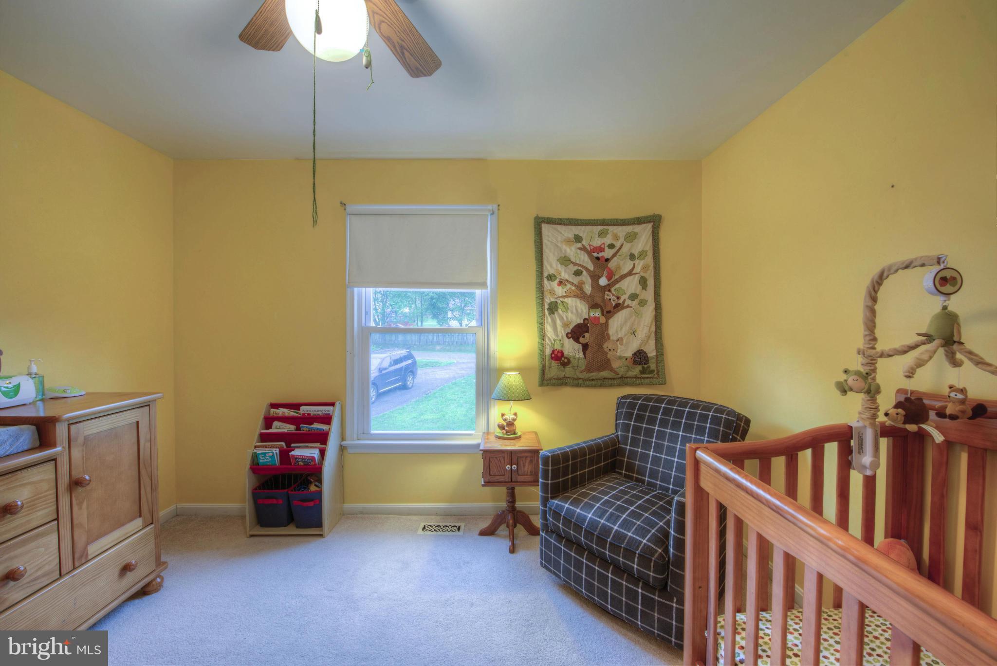 55 Buck Road Stafford, VA 22556 - Photo 13 of 19 a bedroom with a bed and a window