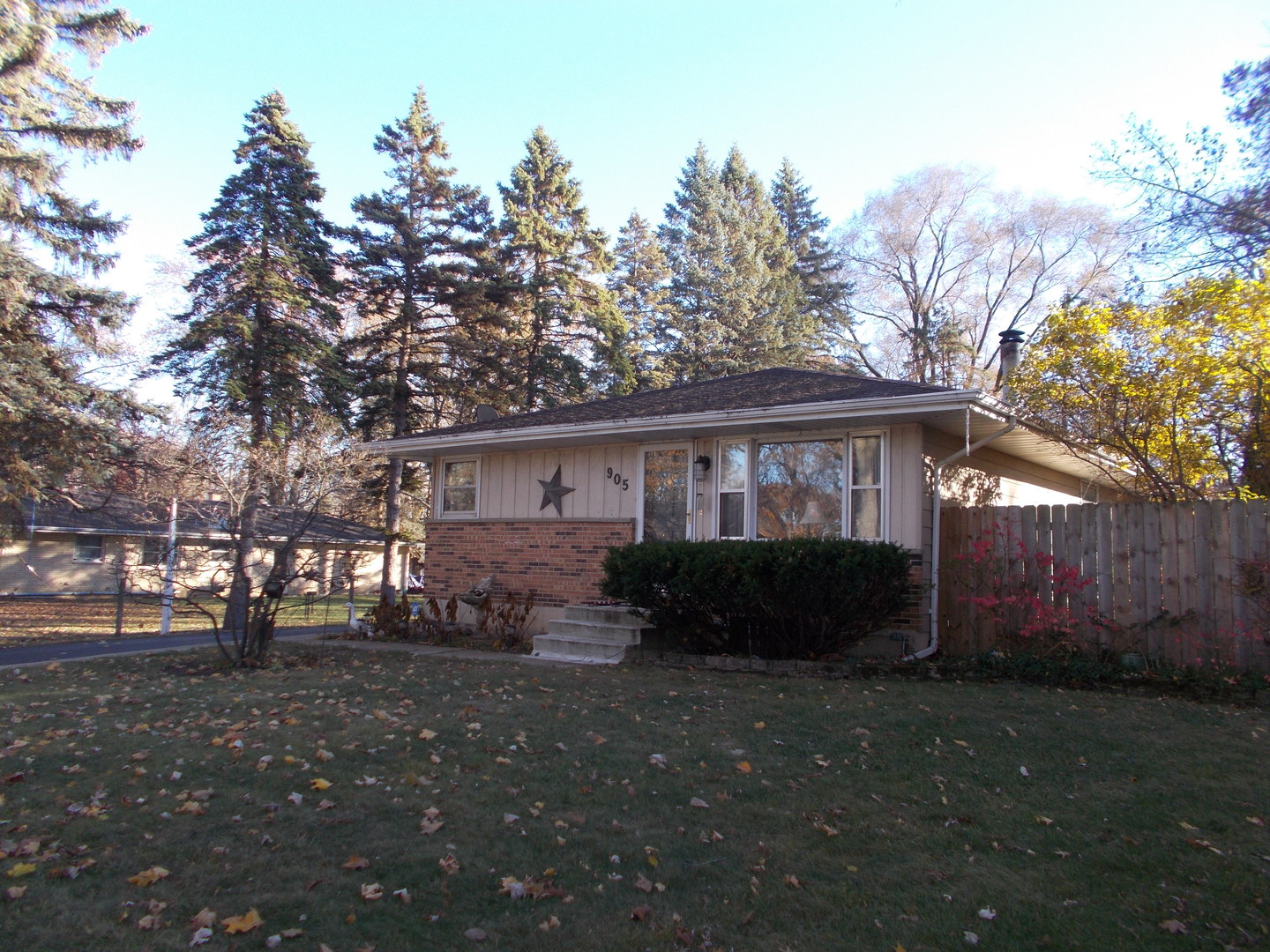 905 Winthrop Court Zion, IL 60099 - Photo 1 of 13 a front view of a house with a garden