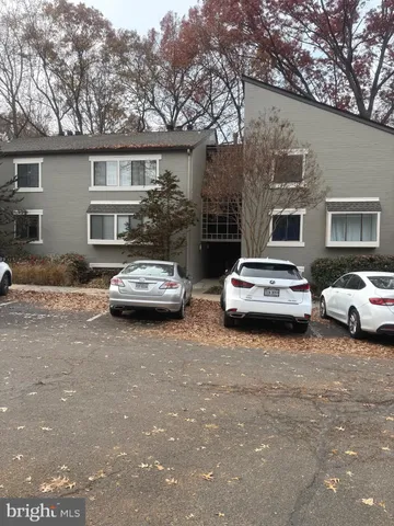 a car parked in front of a house