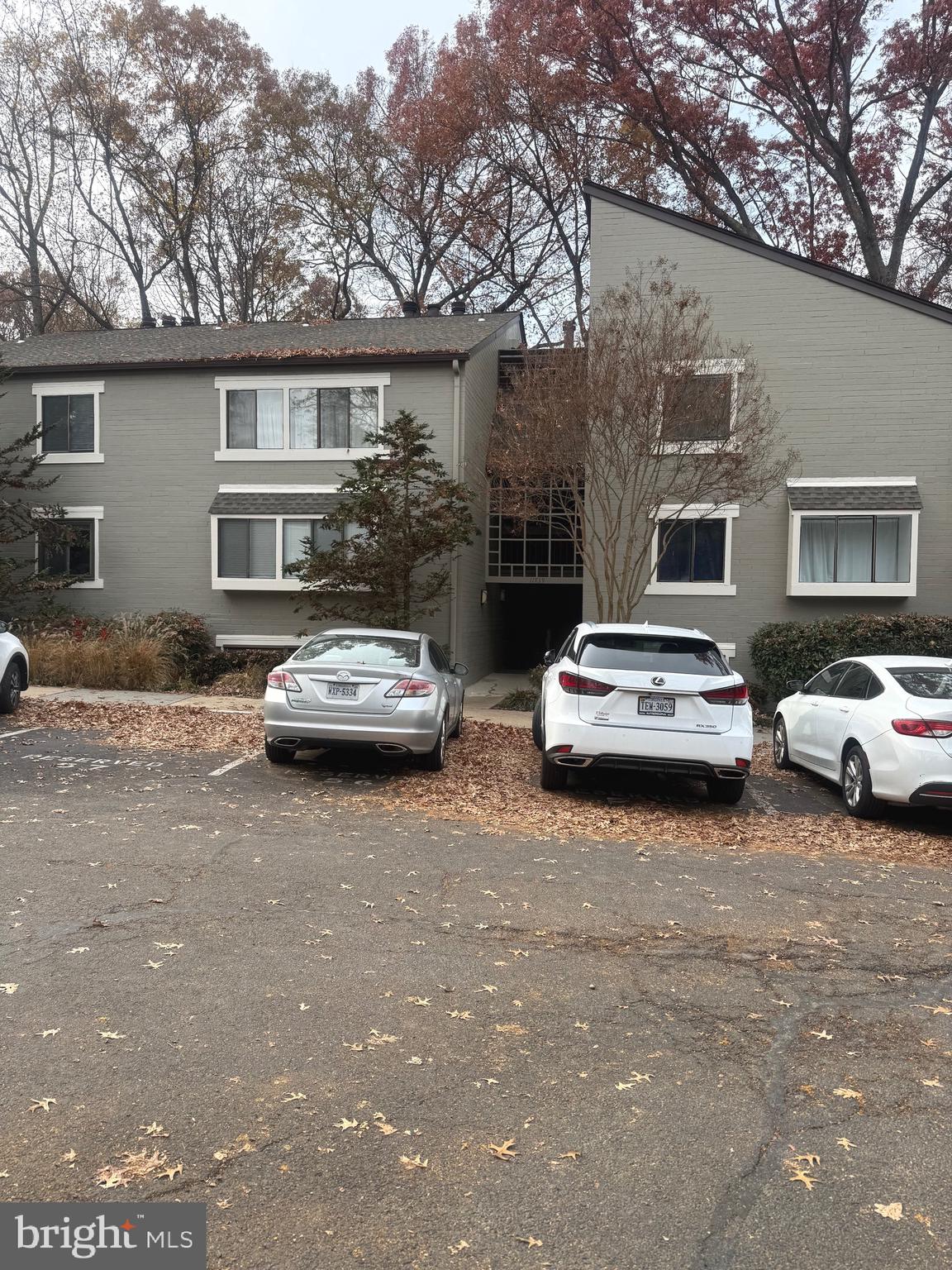 a car parked in front of a house