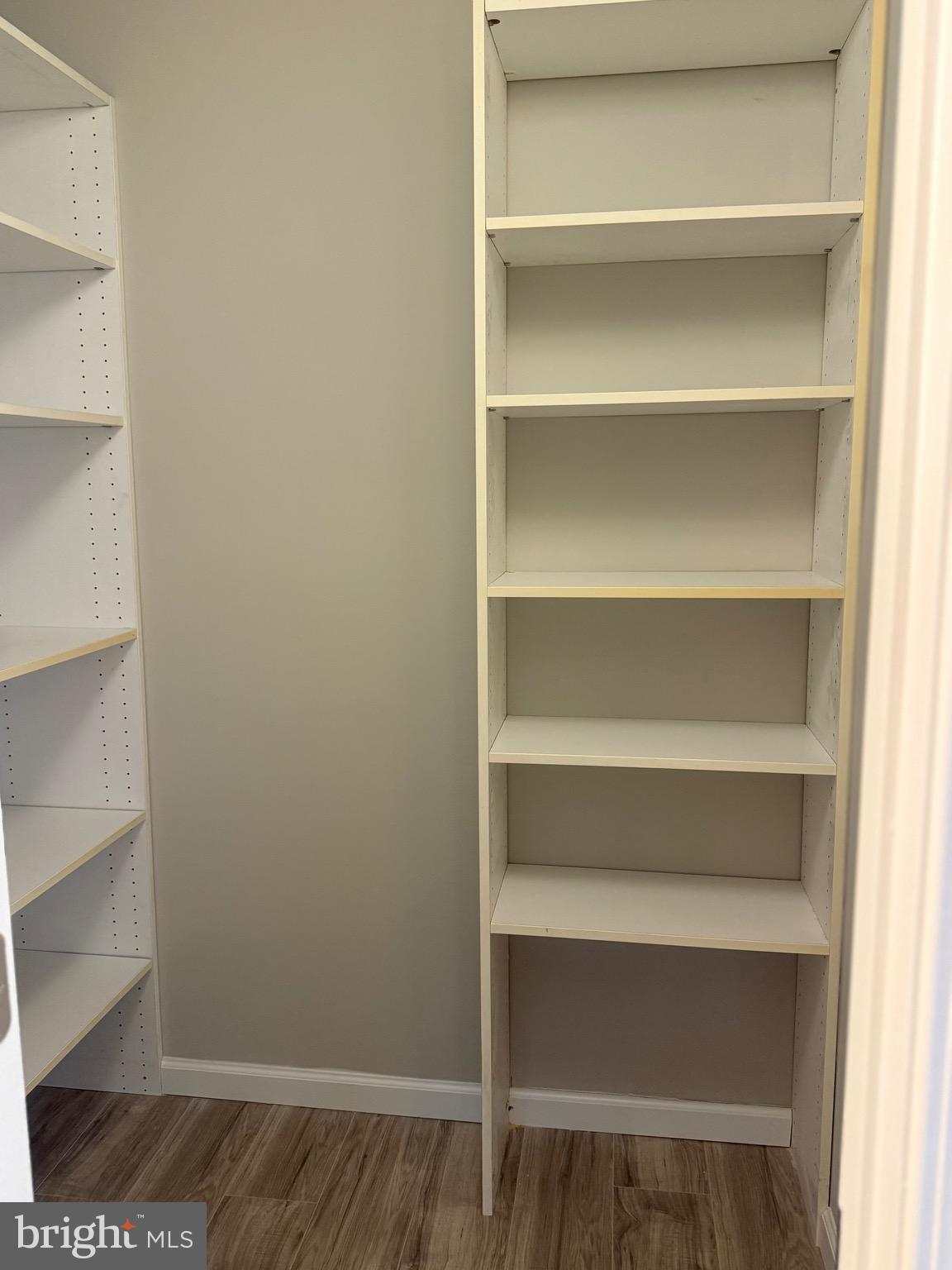 11739 Ledura Court, Unit T7 Reston, VA 20191 - Photo 17 of 17 a view of walk in closet with empty racks