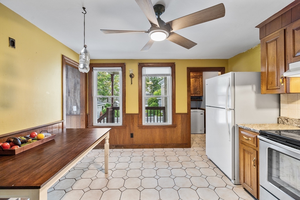 4 State Street, Unit 4 Milford, MA 01757 - Photo 8 of 23 a kitchen with refrigerator and window