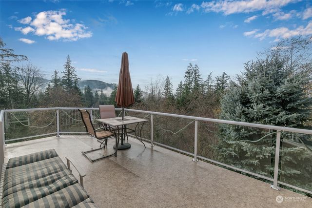 a kitchen with stainless steel appliances a sink and cabinets