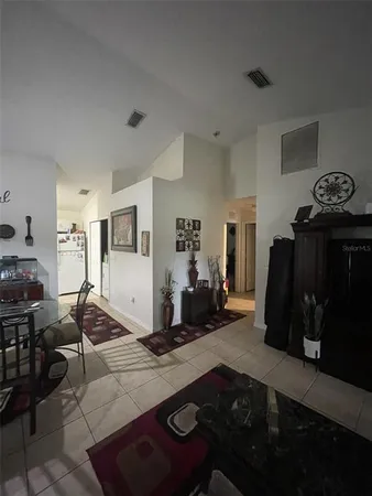 a room with gym equipment and equipment