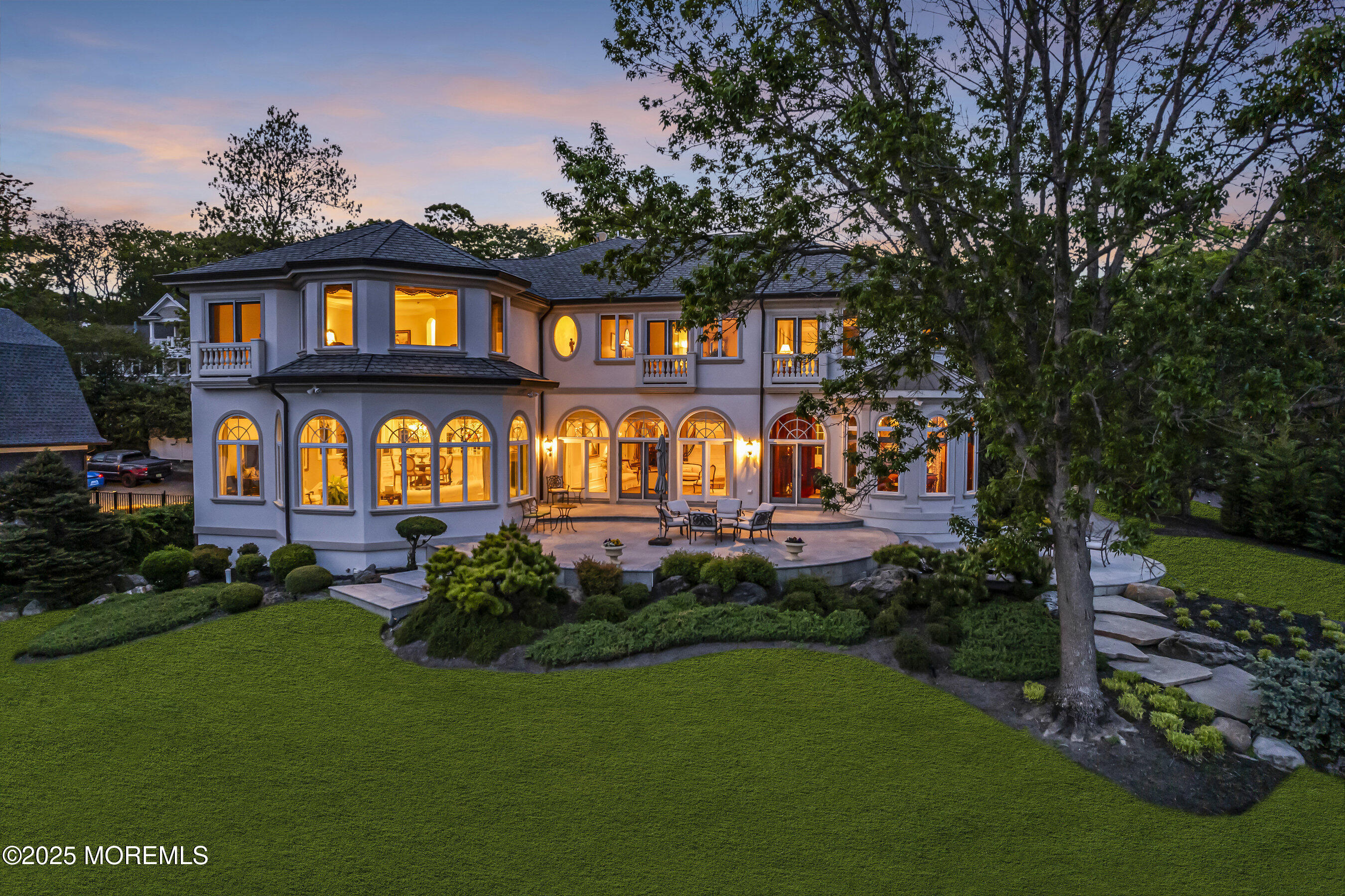 1015 Forrest Road Brielle, NJ 08730 - Photo 2 of 61 a front view of a house with garden