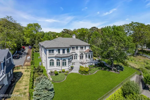 a bedroom with a bed and a fireplace
