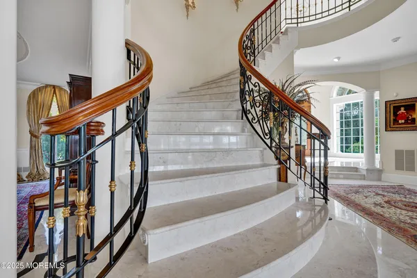 a bedroom with a bed and a fireplace