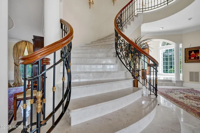 a bedroom with a bed and a fireplace