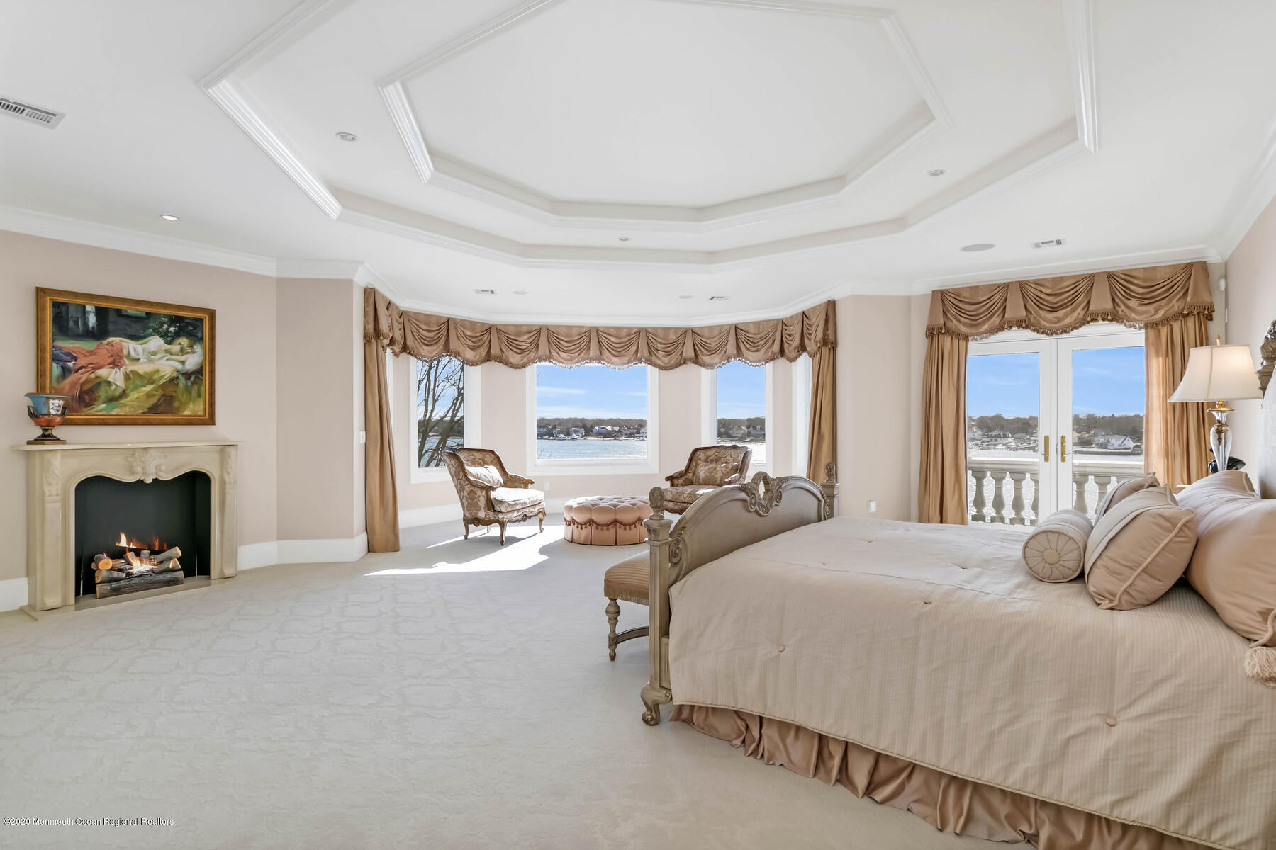 1015 Forrest Road Brielle, NJ 08730 - Photo 23 of 61 a bedroom with a bed and a fireplace