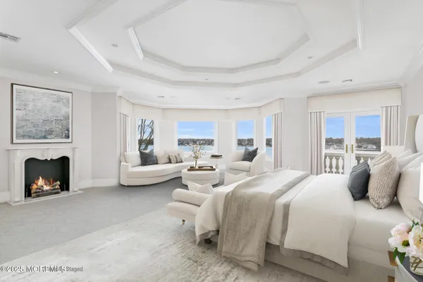 an aerial view of a house with a yard and garden