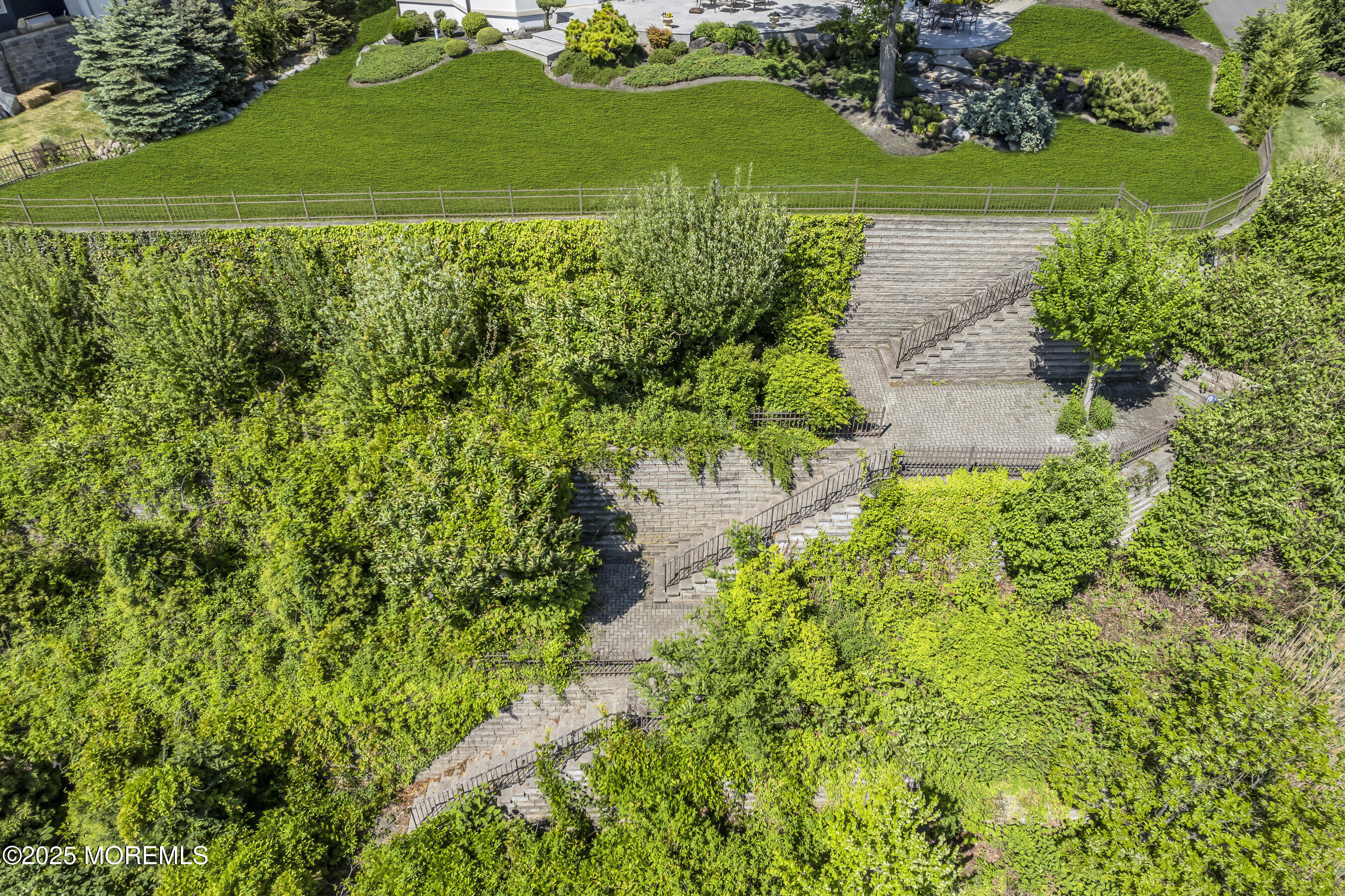 1015 Forrest Road Brielle, NJ 08730 - Photo 28 of 61 a view of a garden with a building