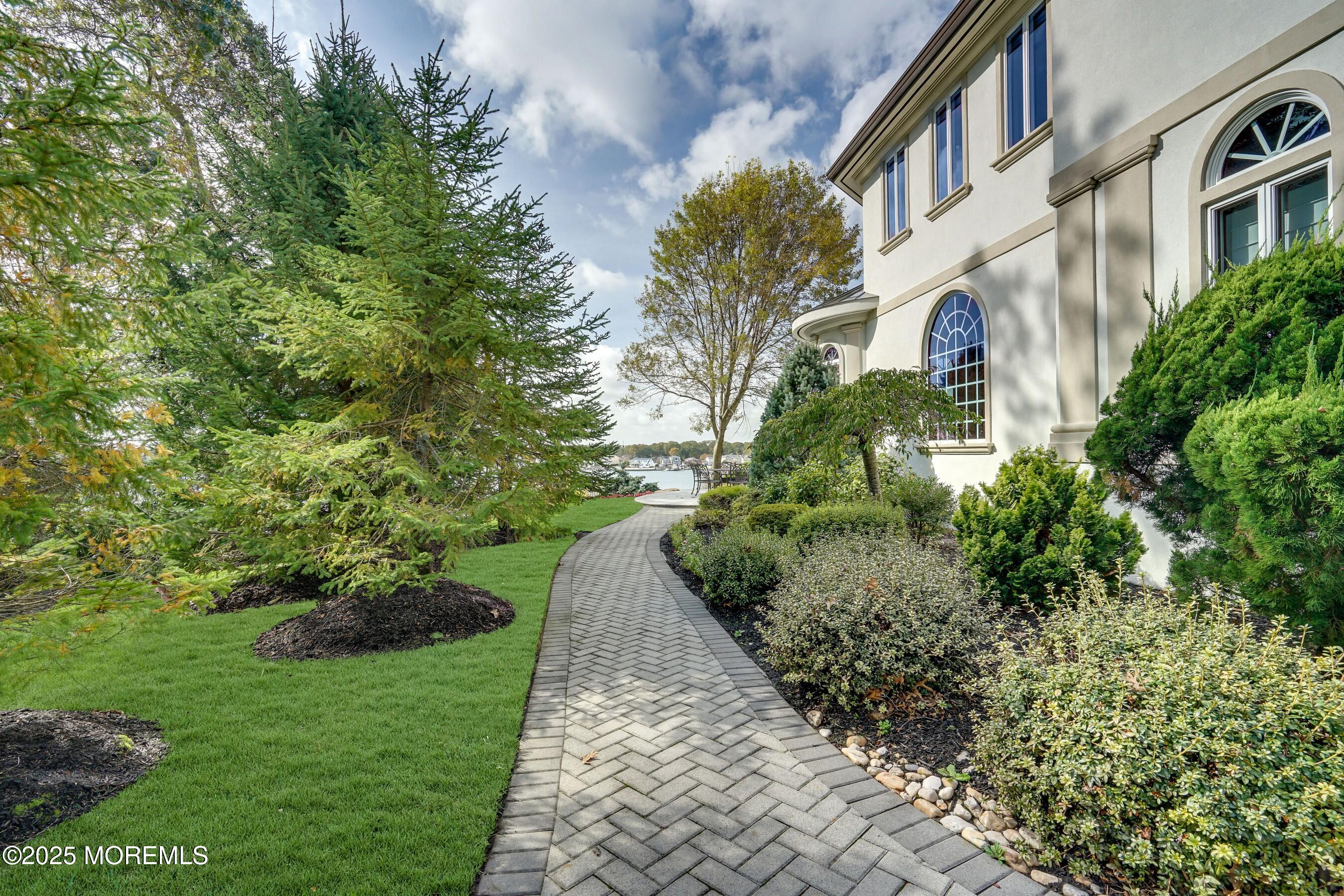 1015 Forrest Road Brielle, NJ 08730 - Photo 42 of 61 a view of a garden with pathway