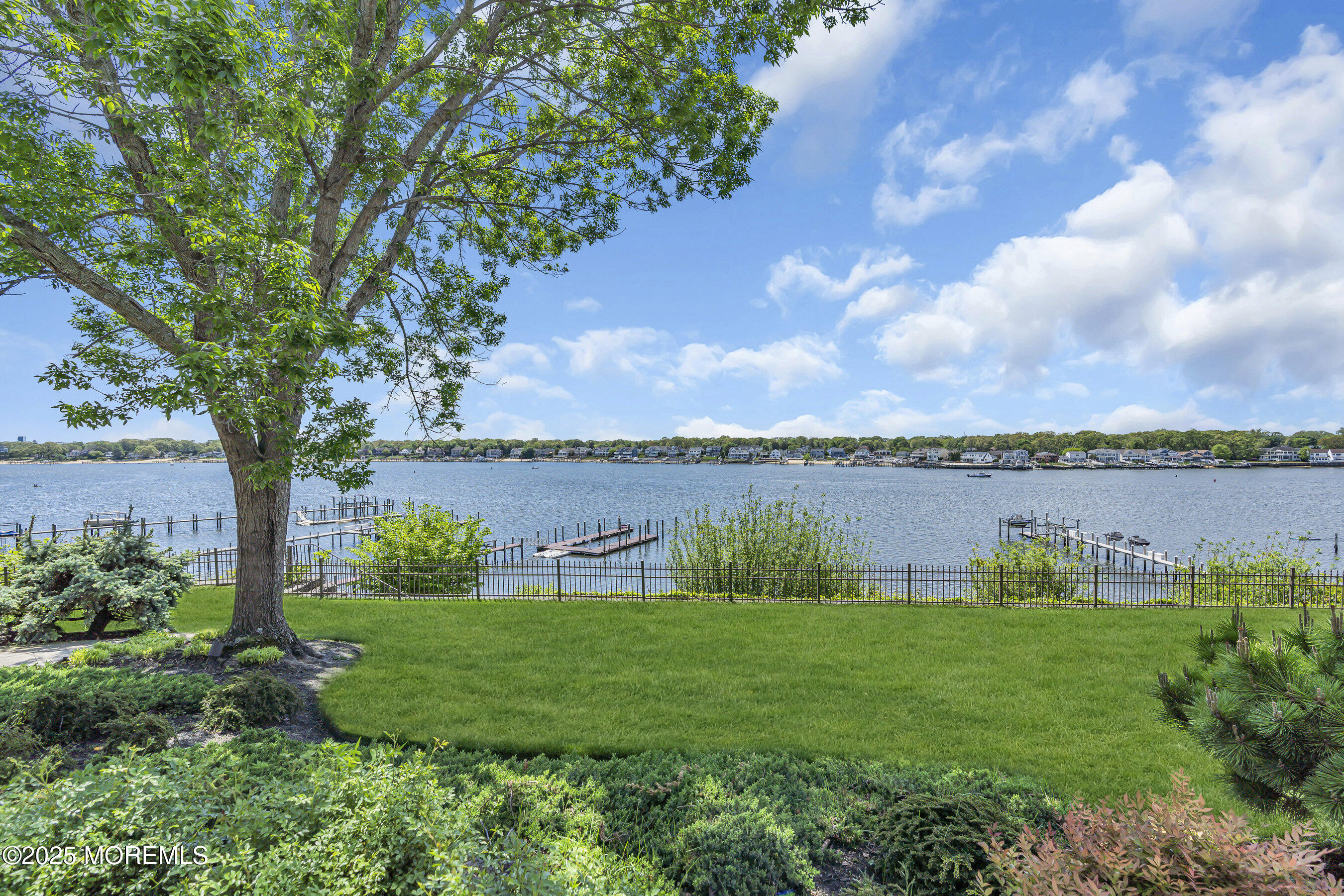 1015 Forrest Road Brielle, NJ 08730 - Photo 49 of 61 a view of a lake with houses in the back