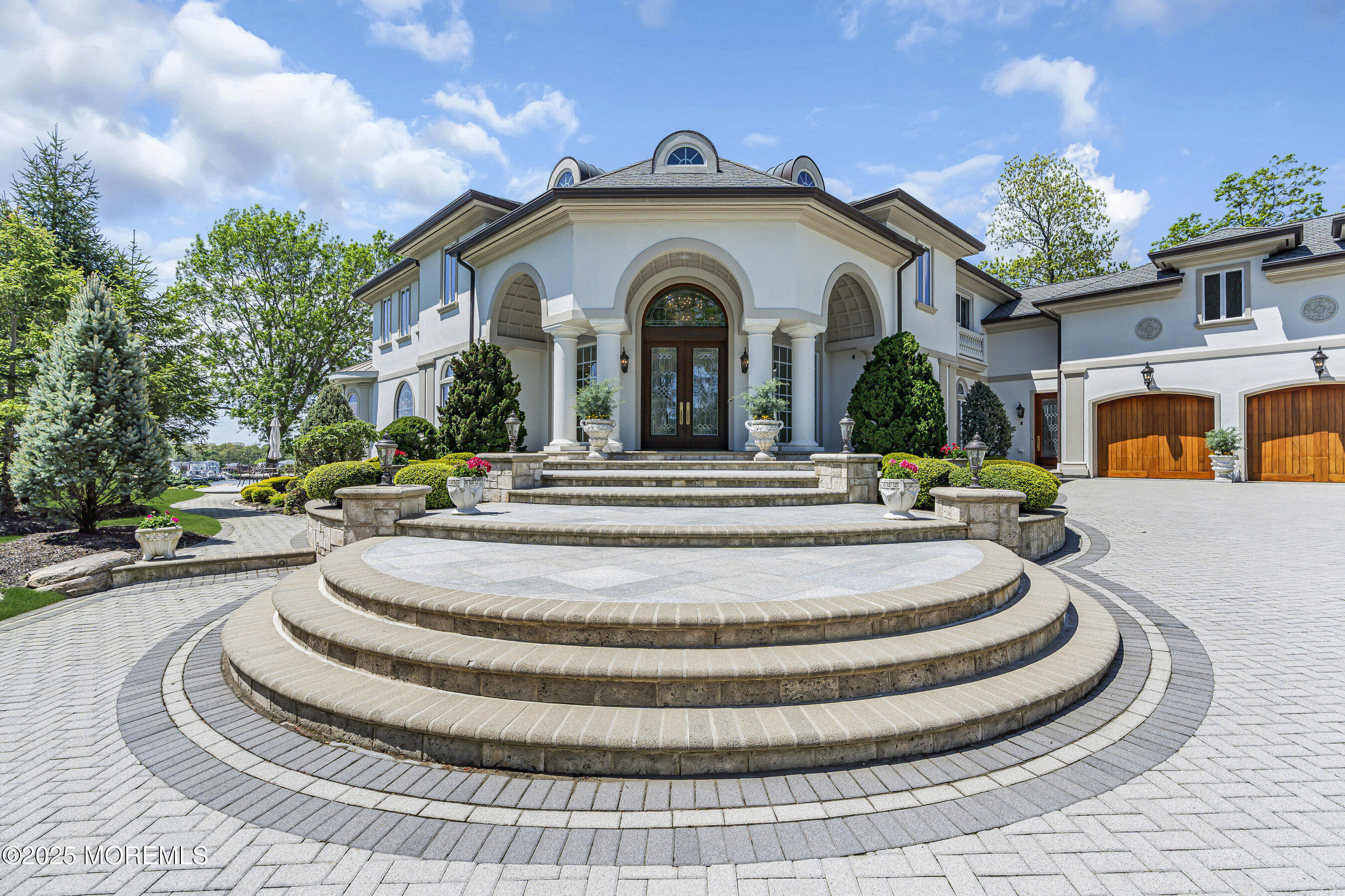 1015 Forrest Road Brielle, NJ 08730 - Photo 5 of 61 a view of a house with a large windows and a clock on a table