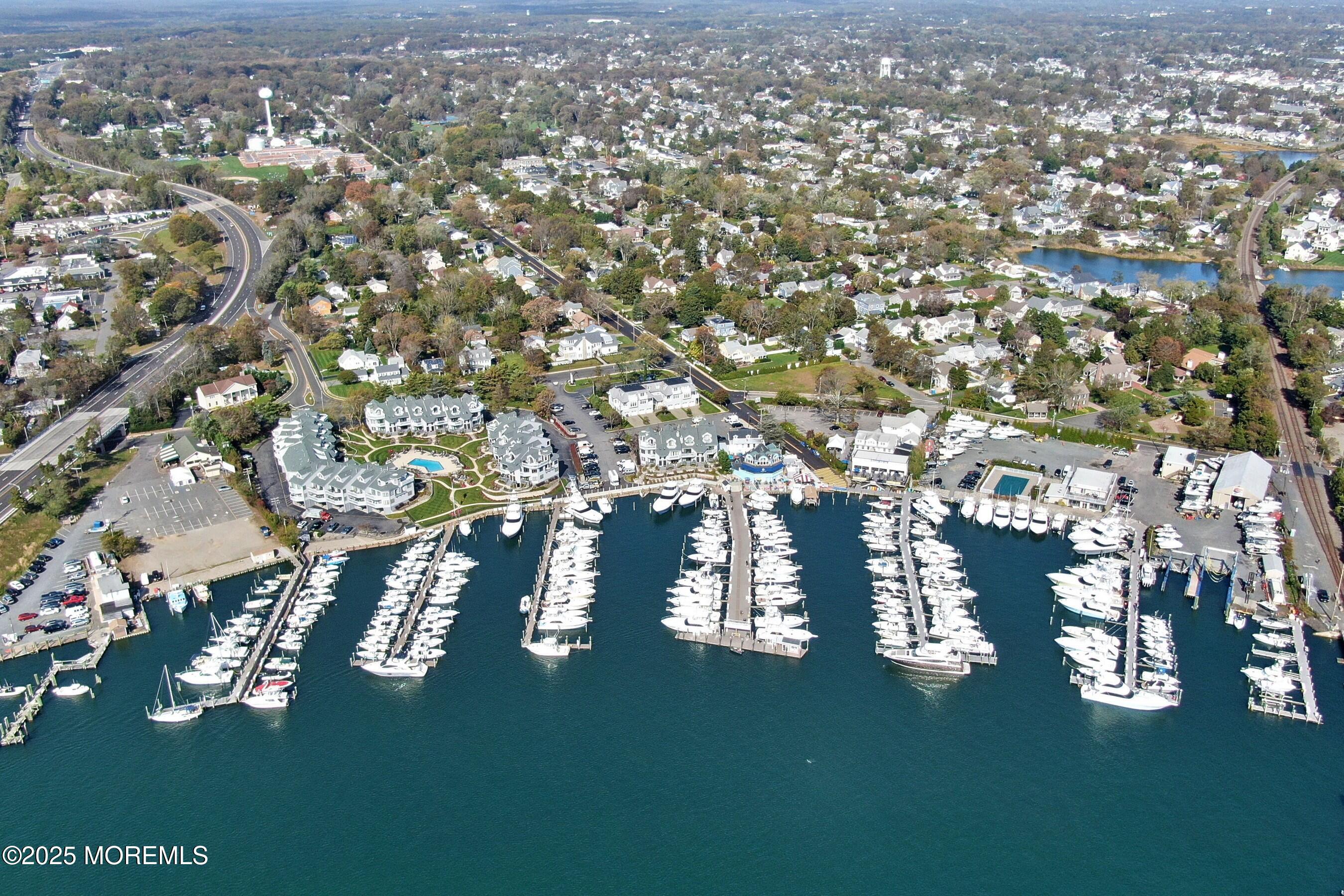 1015 Forrest Road Brielle, NJ 08730 - Photo 52 of 61 a view of residential houses with yard and ocean view