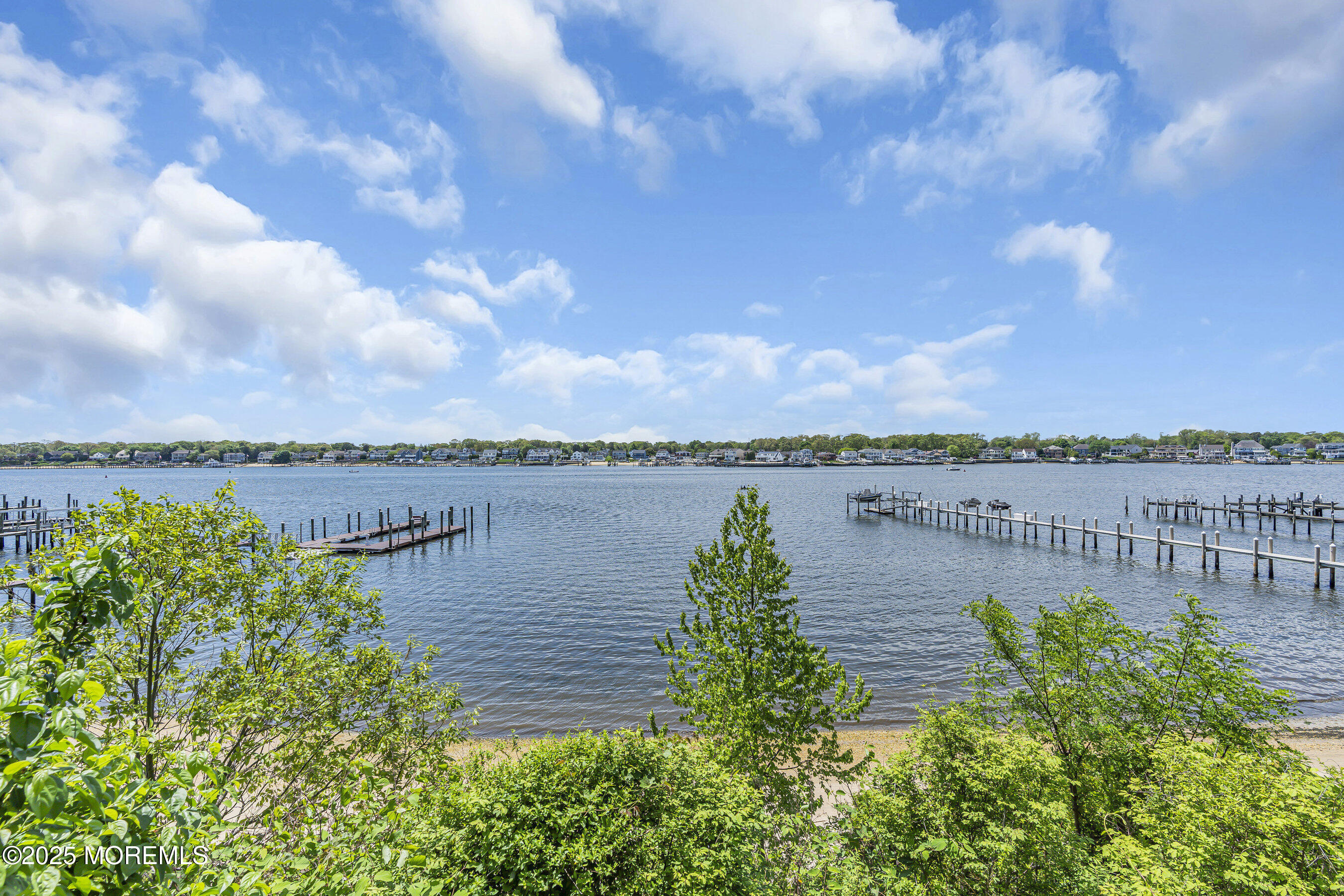 1015 Forrest Road Brielle, NJ 08730 - Photo 53 of 61 a view of a lake with a garden