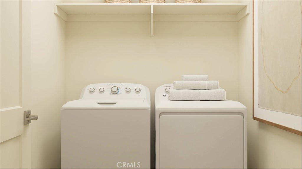 1166 Thunderchief Lane Rialto, CA 92376 - Photo 12 of 16 a utility room with dryer and washer