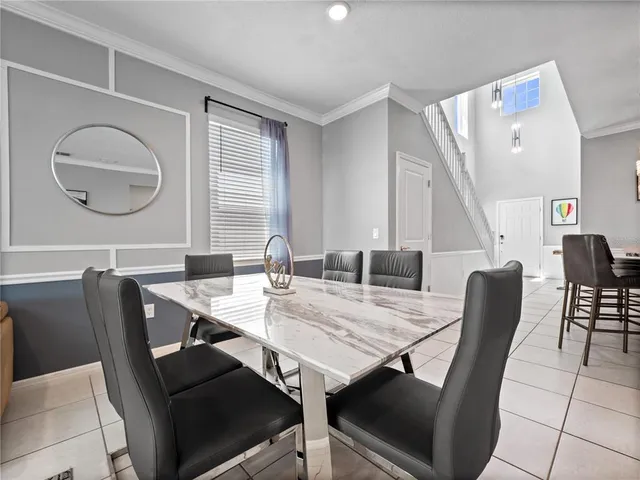 a view of a dining room with furniture