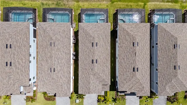 a view of a balcony with potted plants