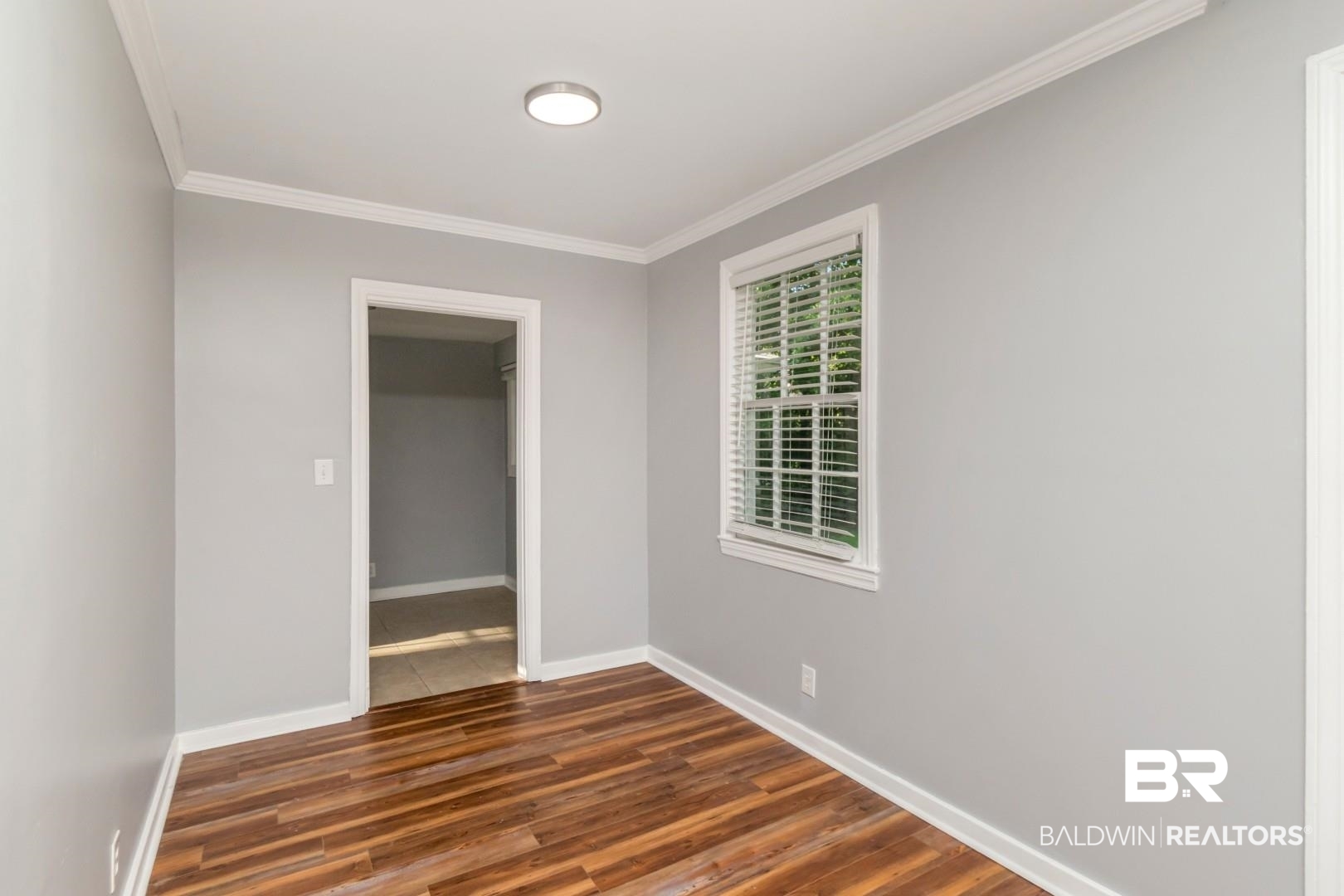 263 Border Drive East Mobile, AL 36608 - Photo 5 of 27 Neutral wall paint with crown molding and baseboards