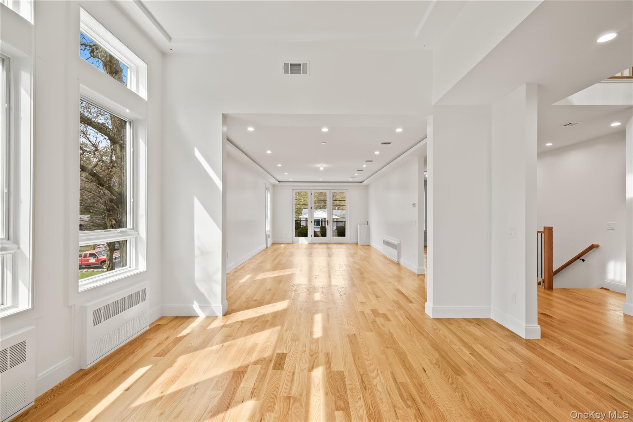 5 Mirror Lake Road, Unit 202 Spring Valley, NY 10977 - Photo 6 of 50 a view of a living room with wooden floor and a large window