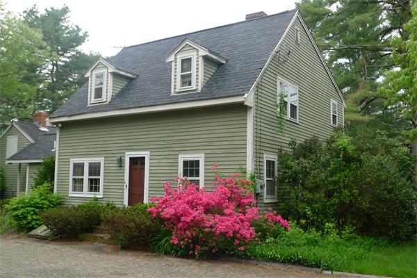 22 Boxford Road Topsfield, MA 01983 - Photo 1 of 3 a front view of house with yard and flowers