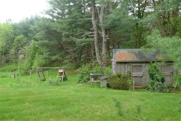 22 Boxford Road Topsfield, MA 01983 - Photo 3 of 3 a view of a chair and table of the garden
