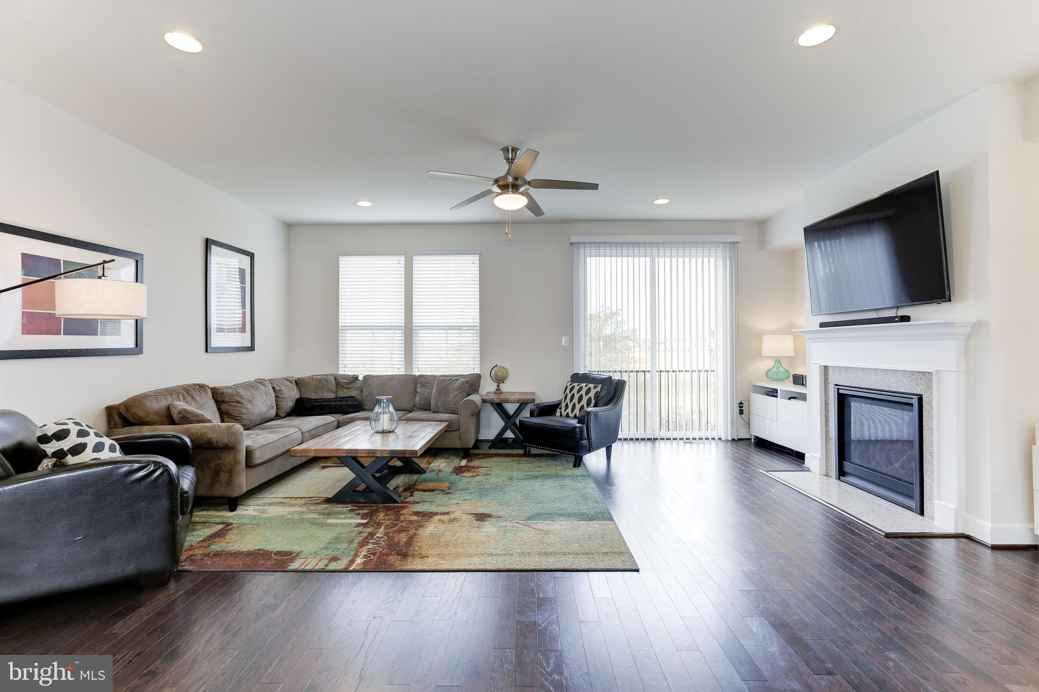 23697 Turtle Point Terrace Ashburn, VA 20148 - Photo 5 of 33 GREAT ROOM WITH GAS FIREPLACE