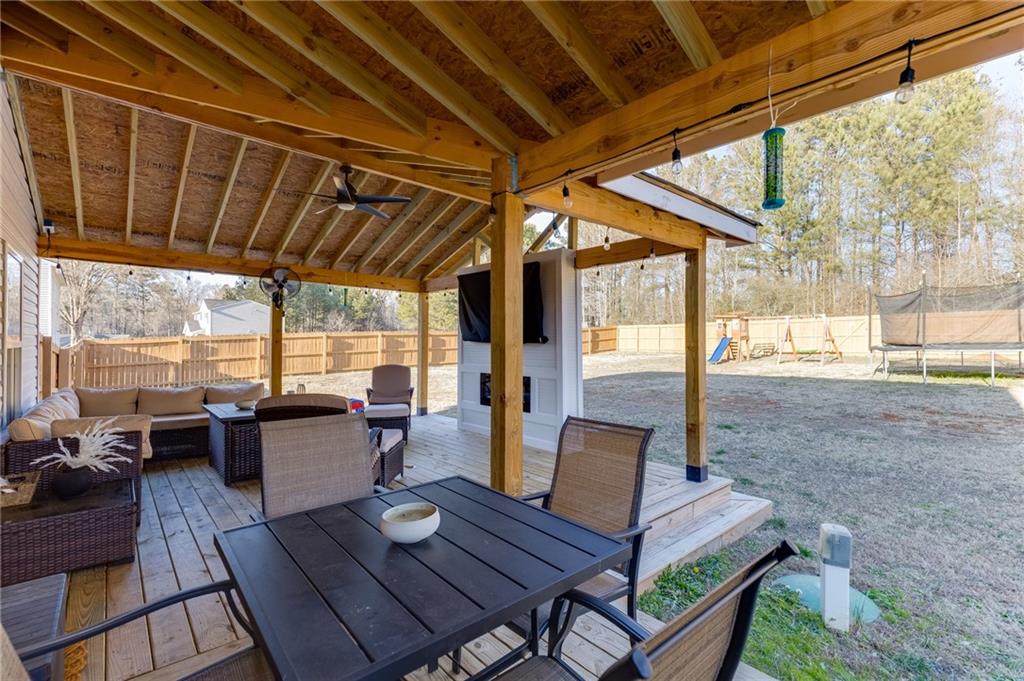 565 Bryson Trail Monroe, GA 30655 - Photo 32 of 43 a view of a patio with wooden floor