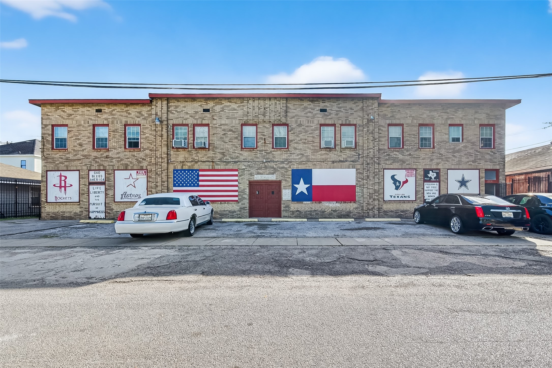 a cars parked in front of a building