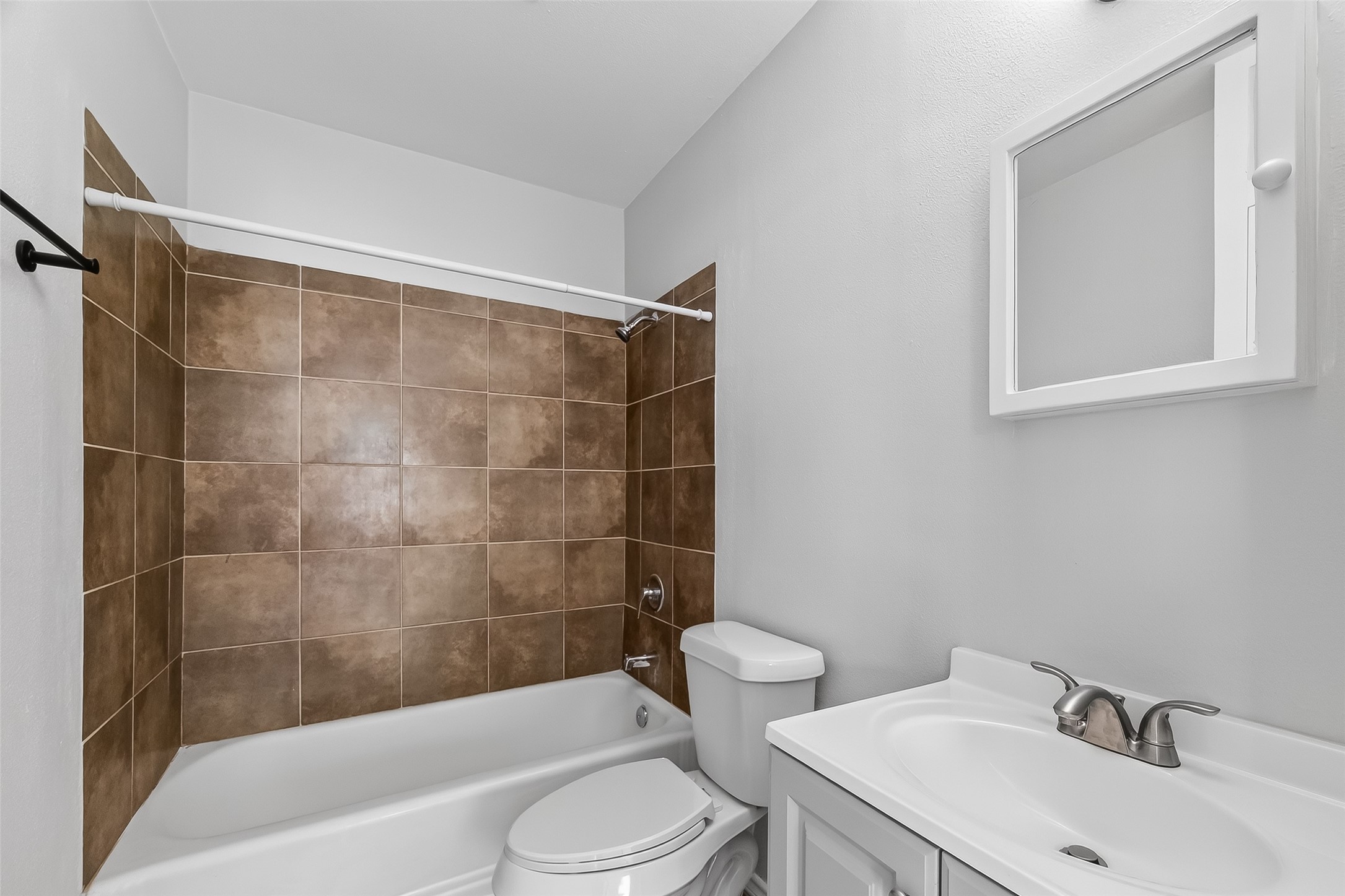 2316 Freeman Street, Unit 6 Houston, TX 77009 - Photo 22 of 25 a bathroom with a sink toilet and shower