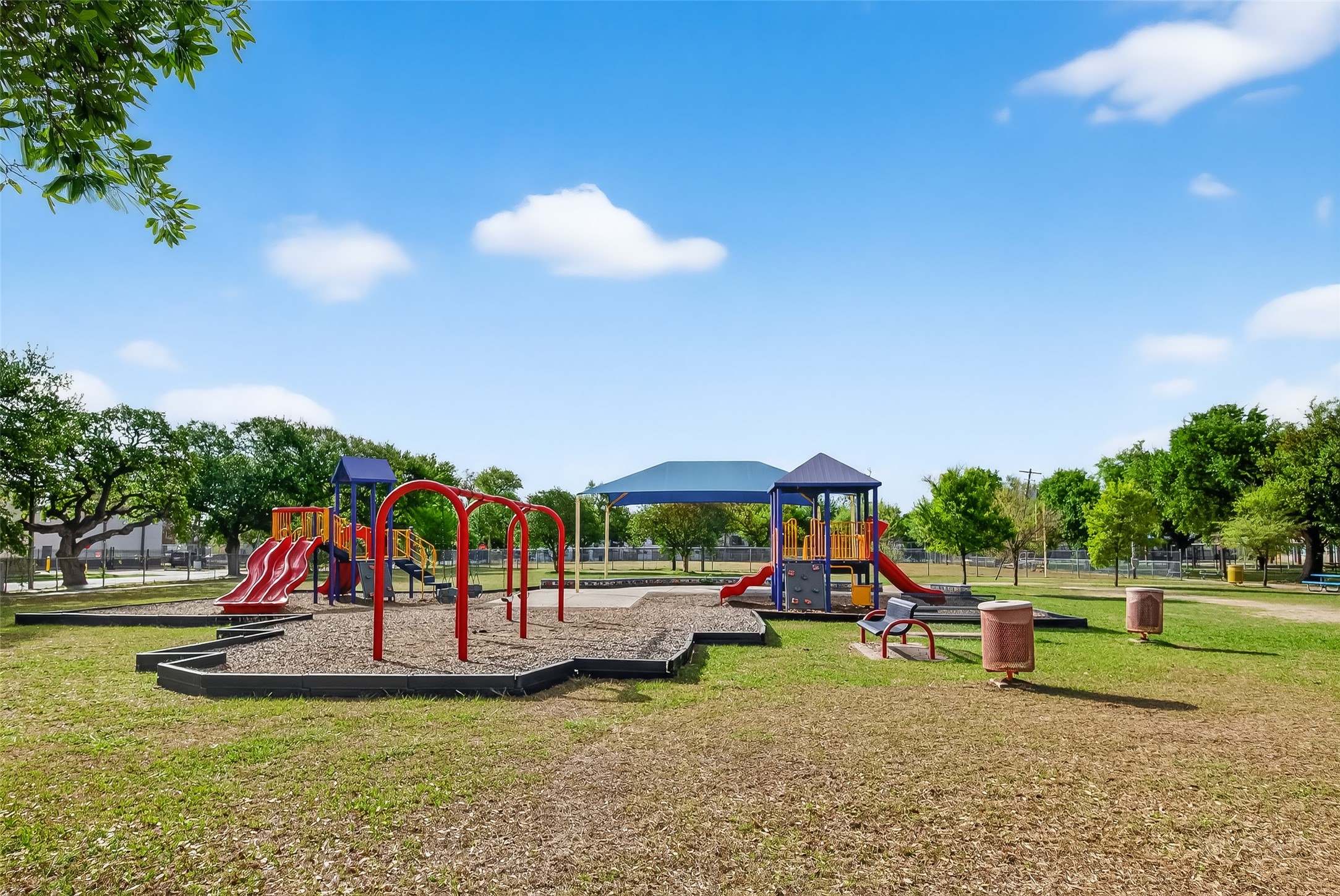 2316 Freeman Street, Unit 6 Houston, TX 77009 - Photo 25 of 25 a childrens park with lots of swings and slides