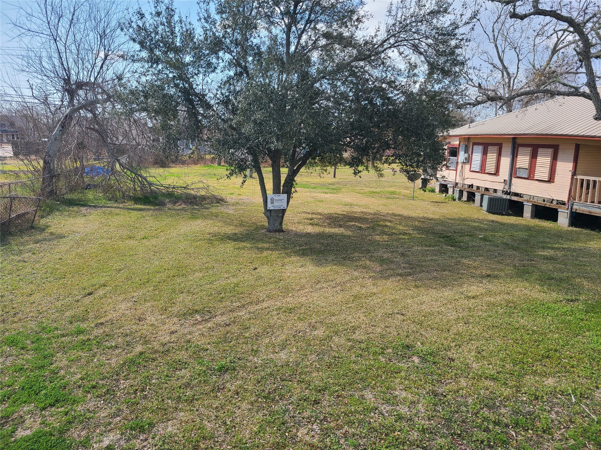 0 West Broad Street Freeport, TX 77541 - Photo 3 of 7 a view of a house with a yard