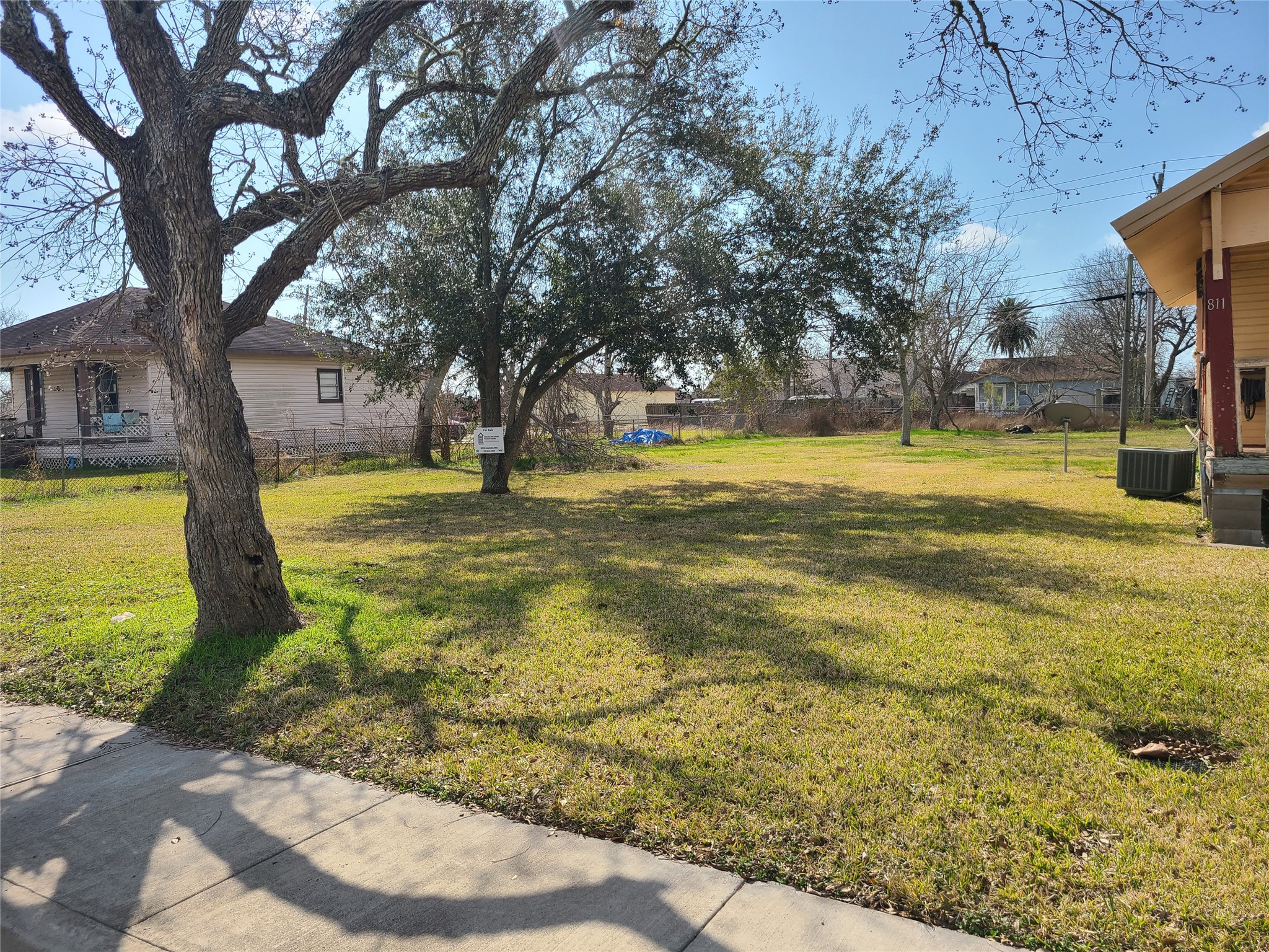 0 West Broad Street Freeport, TX 77541 - Photo 4 of 7 a swimming pool with trees in the background