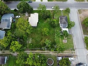 0 West Broad Street Freeport, TX 77541 - Photo 7 of 7 an aerial view of a house with a yard and lake view