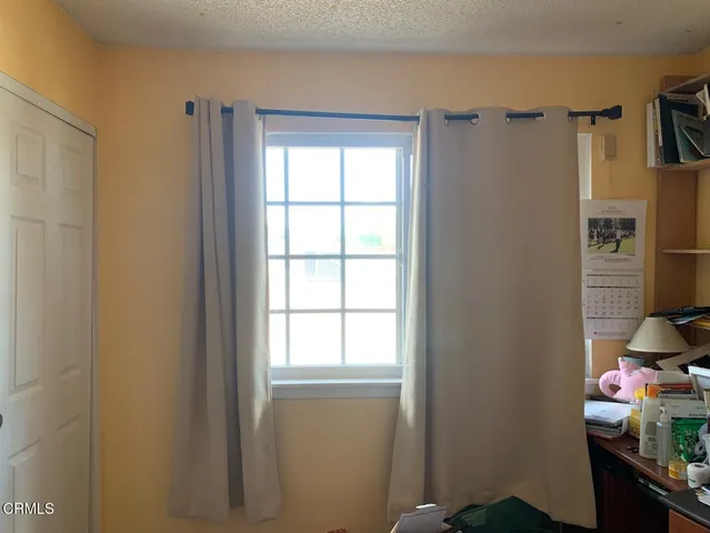 a view of a room with a window