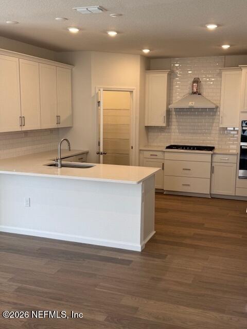 73 Chestnut Grv Road St. Augustine, FL 32092 - Photo 3 of 18 a kitchen with stainless steel appliances granite countertop a white stove top oven and white cabinets