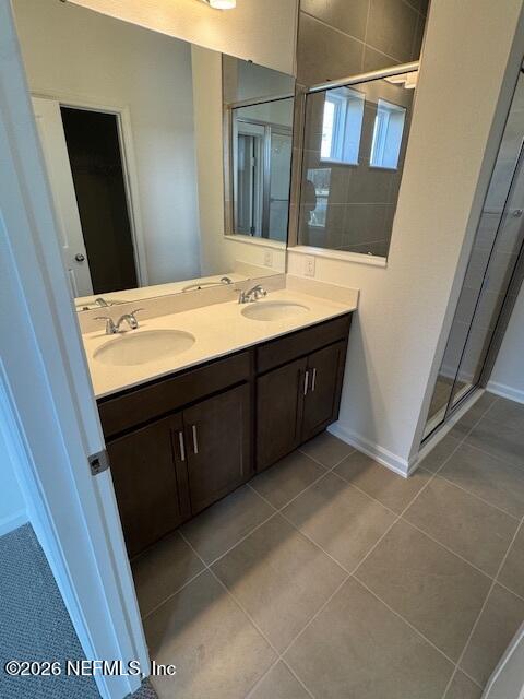 73 Chestnut Grv Road St. Augustine, FL 32092 - Photo 7 of 18 a bathroom with a double vanity sink and mirror