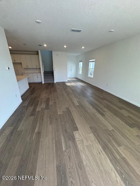 73 Chestnut Grv Road St. Augustine, FL 32092 - Photo 9 of 18 wooden floor in an empty room with a window