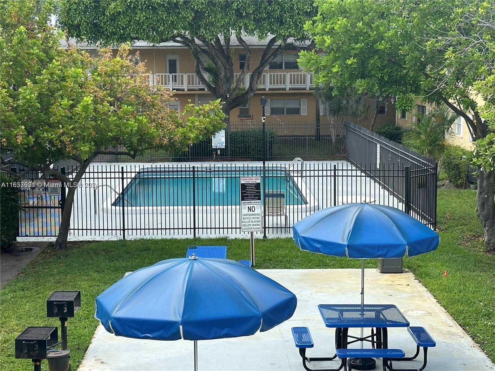 Sequoia Gardens Condominiums Deerfield Beach, FL 33441 - Photo 25 of 25 a view of house with backyard and furniture