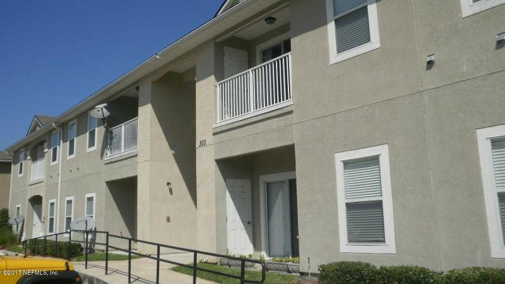 a view of a building from a balcony