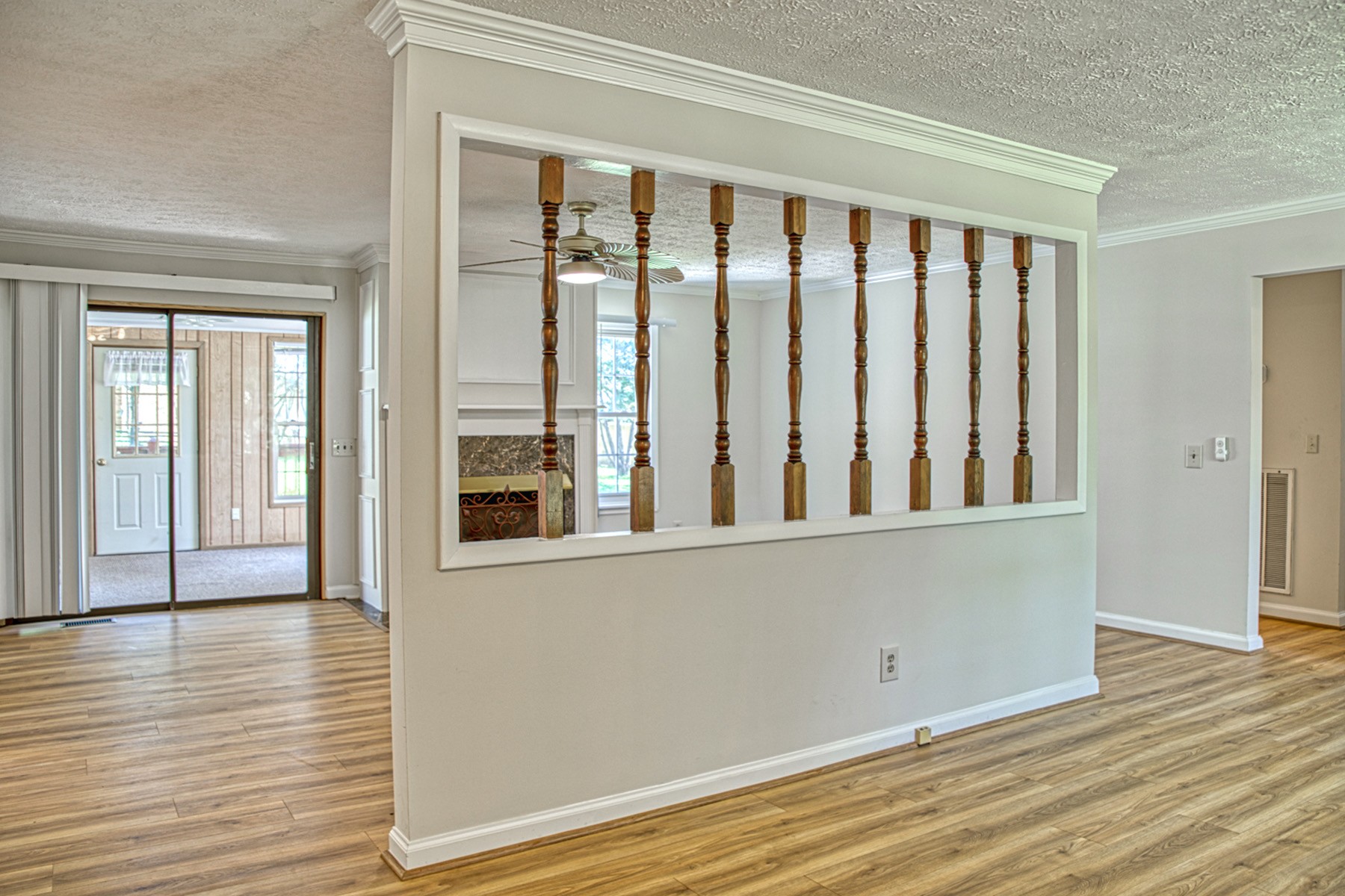 2085 Herbert Garrett Road Cookeville, TN 38506 - Photo 7 of 39 a view of wooden floor and a window in a room