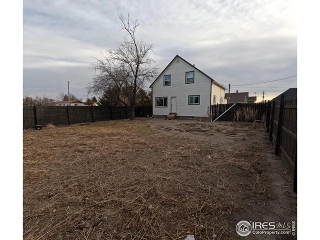a view of a house with a deck