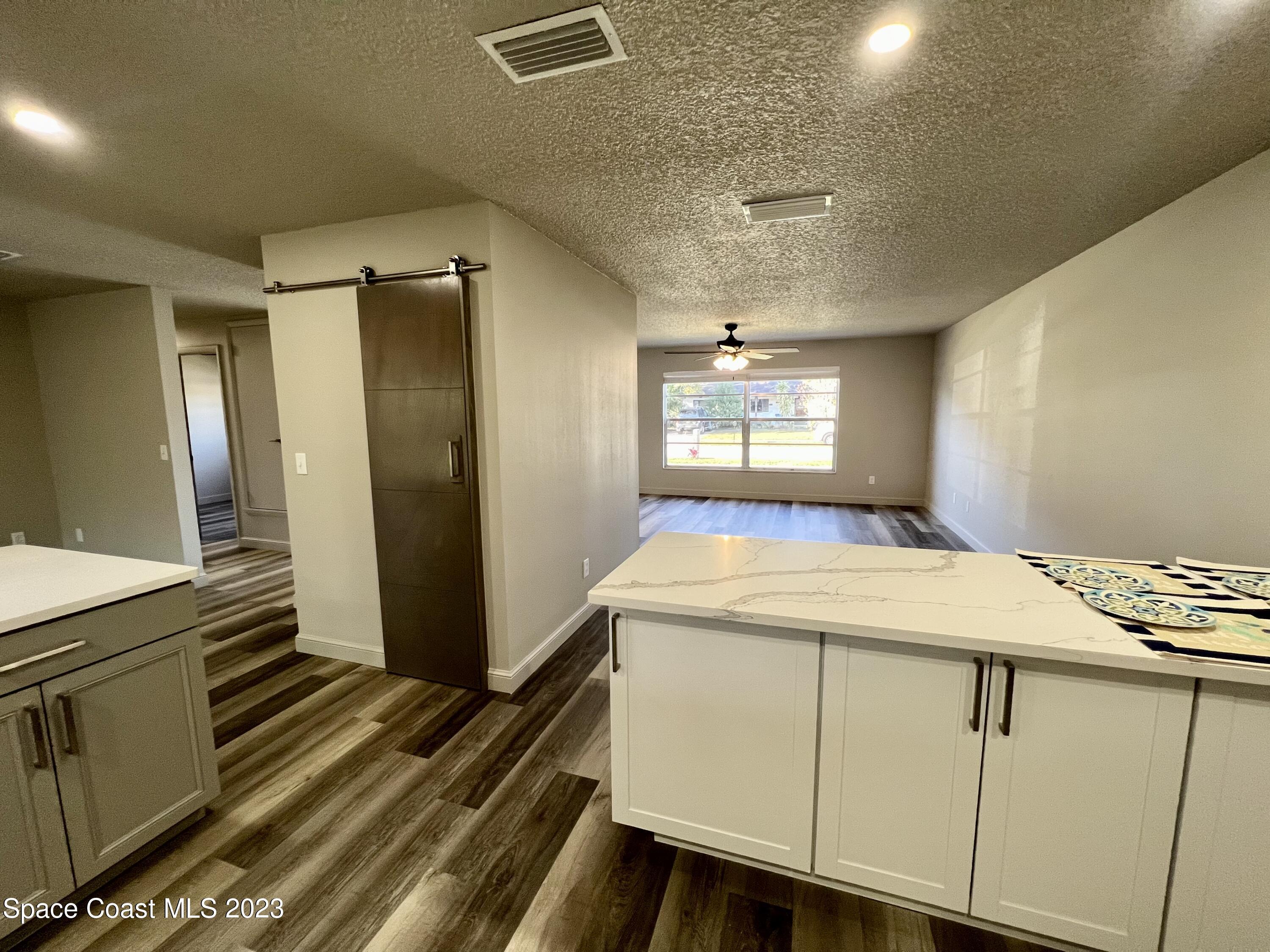 1095 Coronado Drive Rockledge, FL 32955 - Photo 11 of 28 a room with storage and utility