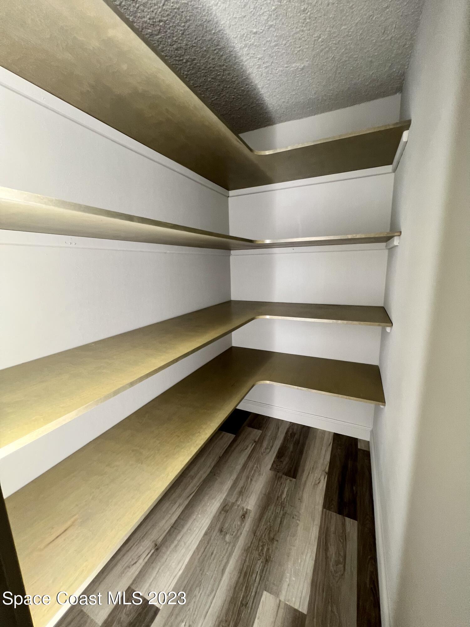 1095 Coronado Drive Rockledge, FL 32955 - Photo 16 of 28 a storage room with an outdoor seating