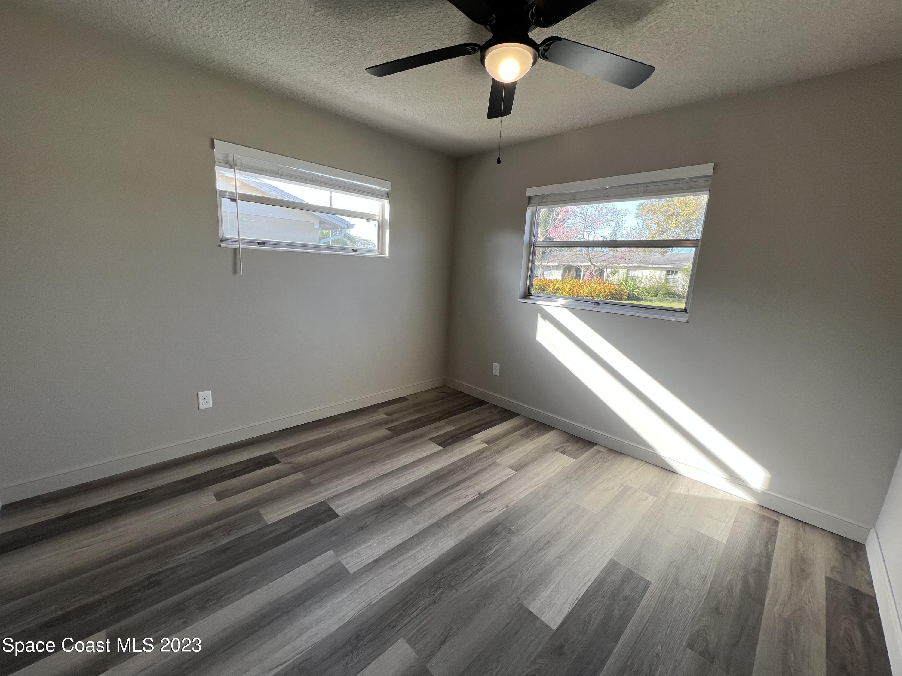 1095 Coronado Drive Rockledge, FL 32955 - Photo 25 of 28 a view of an empty room and window