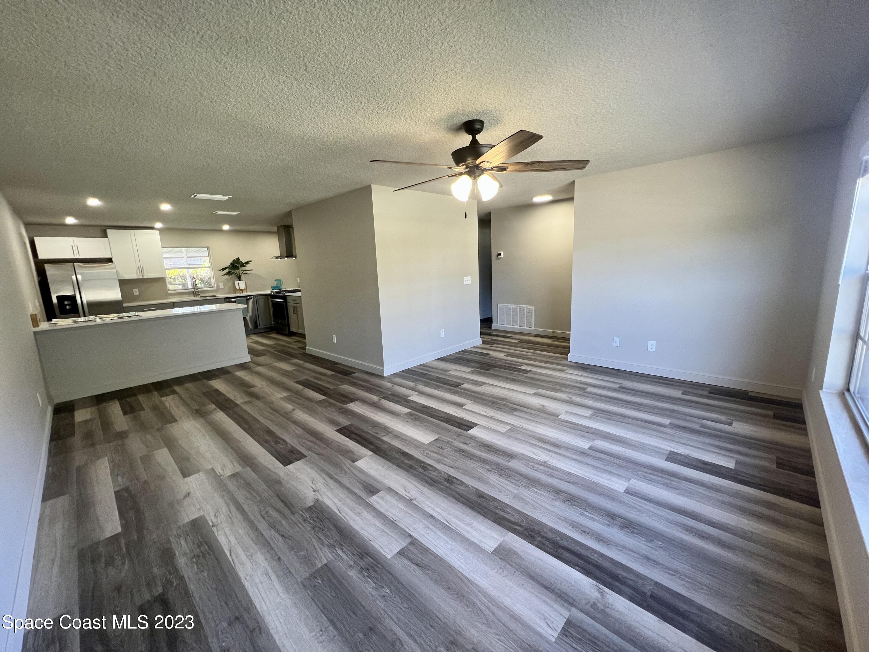 1095 Coronado Drive Rockledge, FL 32955 - Photo 5 of 28 a view of a kitchen with a sink