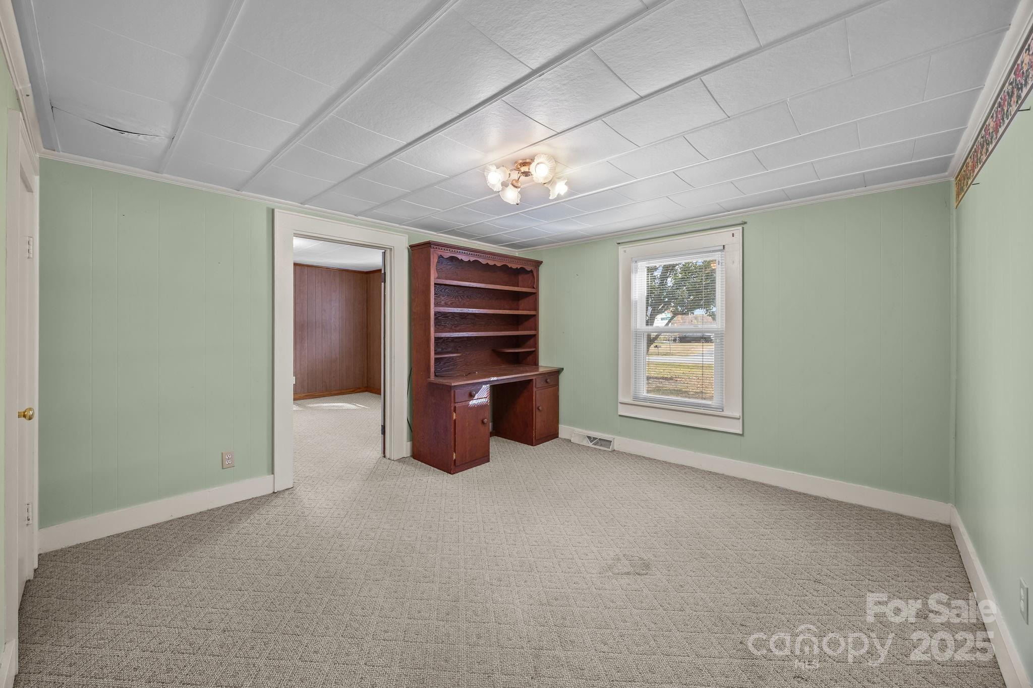 3020 Old Union Church Road Salisbury, NC 28146 - Photo 11 of 48 an empty room with furniture and window