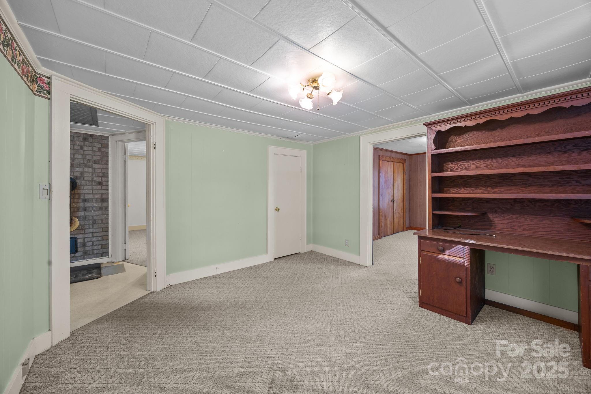 3020 Old Union Church Road Salisbury, NC 28146 - Photo 12 of 48 a view of an empty room with a fireplace