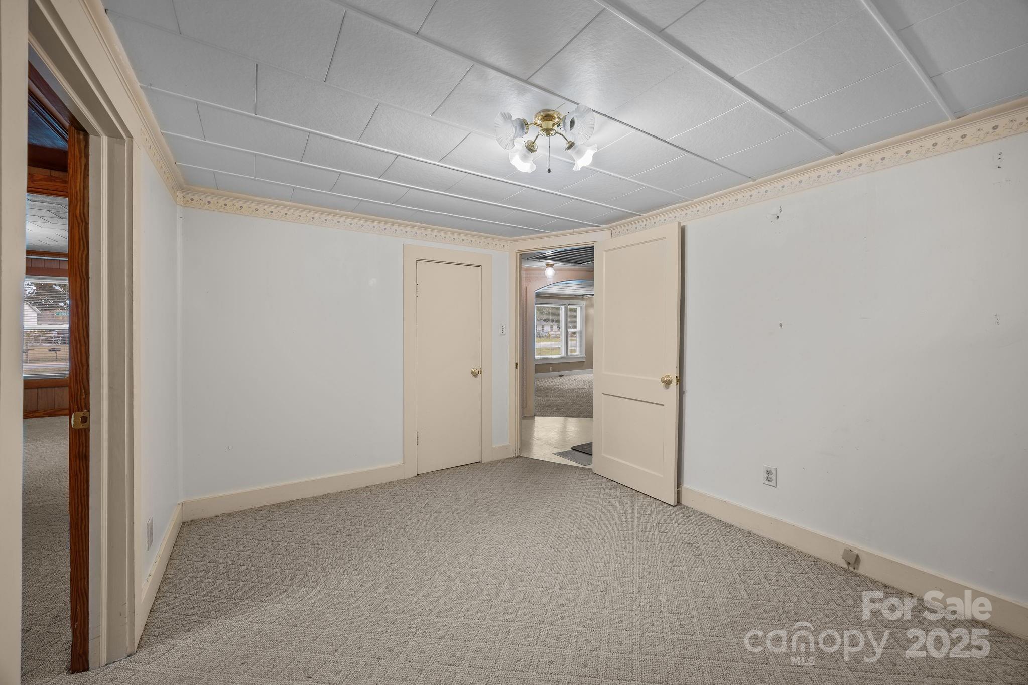 3020 Old Union Church Road Salisbury, NC 28146 - Photo 20 of 48 a view of a livingroom with a projector & furniture